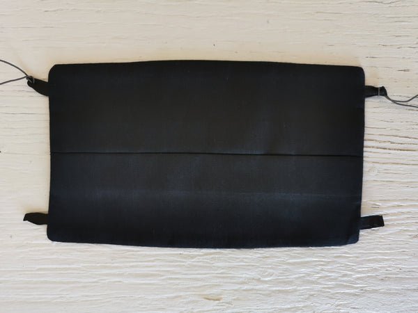 Cubrebocas - Azul aqua y negro en el reverso.